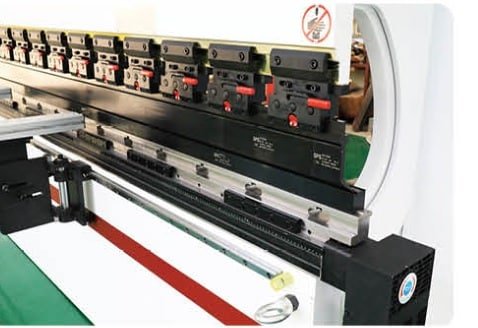 Mechanical deflection compensation device for CNC press brake