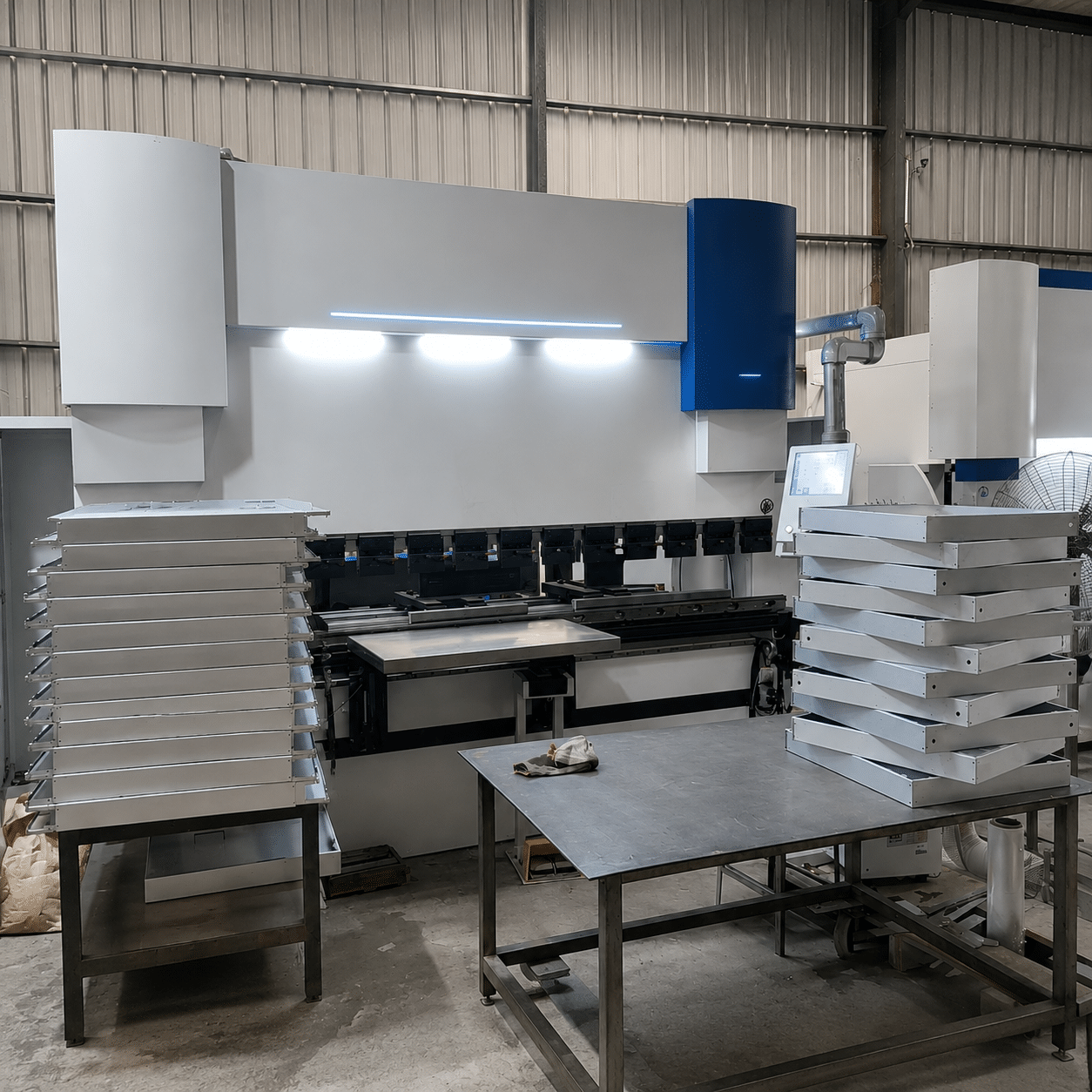 Automated sheet metal laser cutting production line in factory workshop