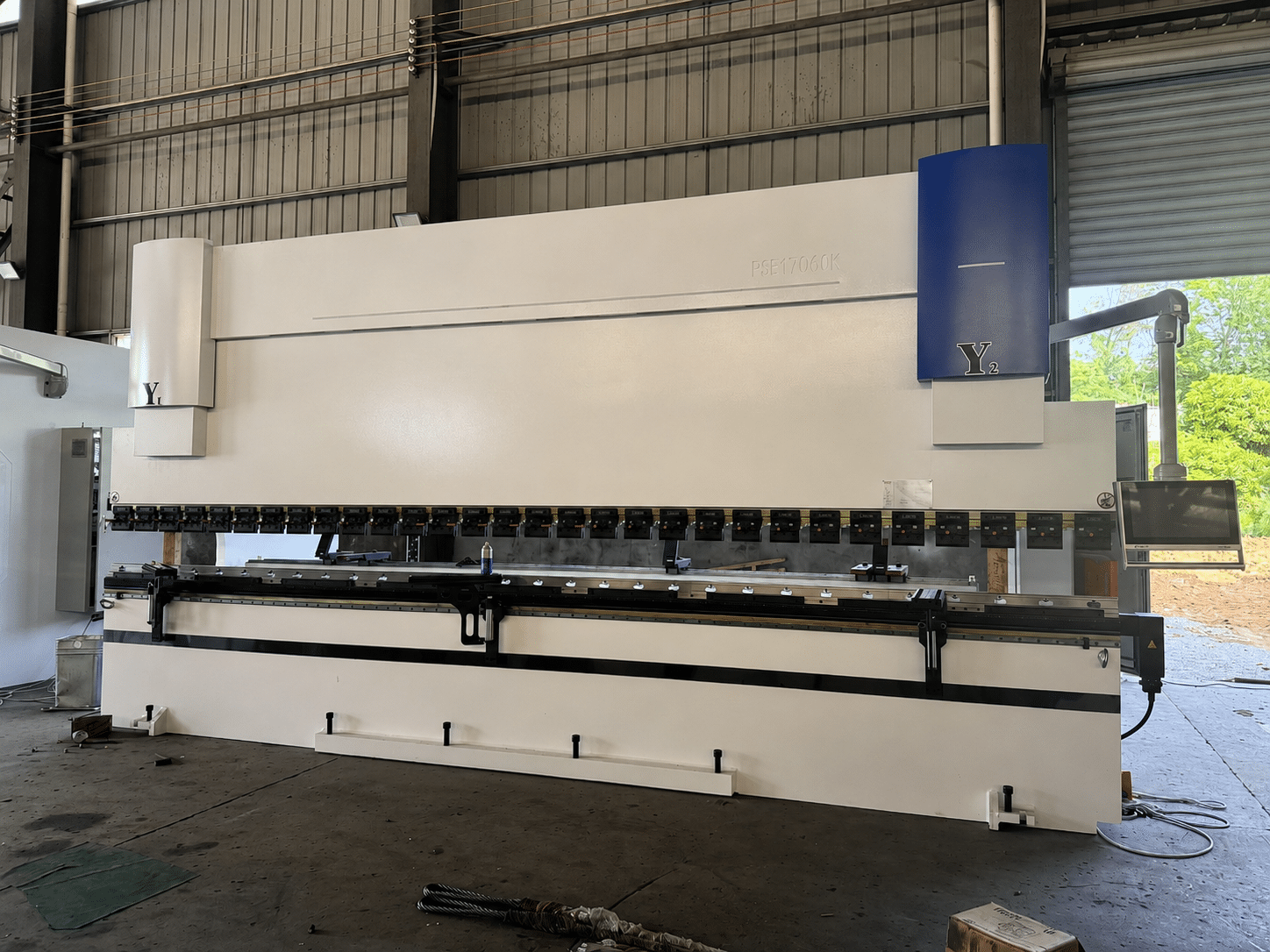 Large CNC press brake machine used for bending thick stainless steel sheets and plates