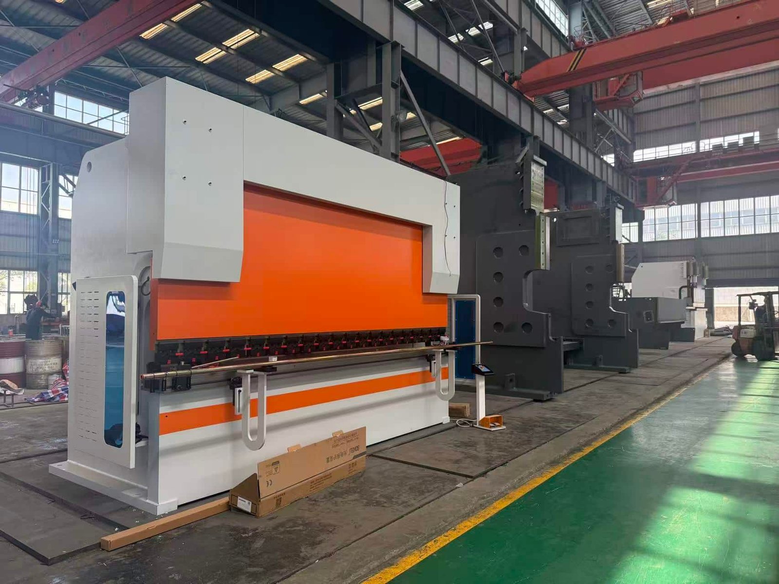 Hydraulic press brake machine in sheet metal fabrication workshop