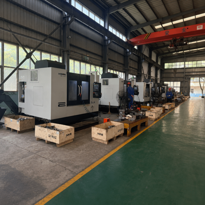 Sheet metal fabrication machines in metalworking workshop